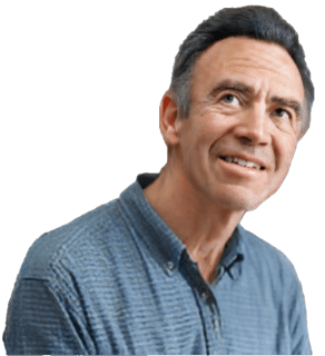 A reversed enhanced colorized photographic headshot and upper torso of Peter Markie with a twisted head turned up to the sky to the right wearing a blue shirt used for visually identifying him.
