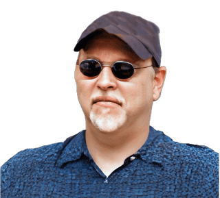A reversed enhanced colorized photographic headshot cutout of dark sunglasses adorned Tad Schmaltz with a white goatee wearing a ball cap and a dark blue collared  shirt with black patterning and the top button unfastened used for visually identifying him.