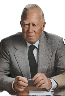 An enhanced colorized old non-color newspaper photographic headshot and upper torso cutout of a seated G. H. von Wright wearing a gray suit jacket  and black tie with his hands holding a pen used to visually identify him.