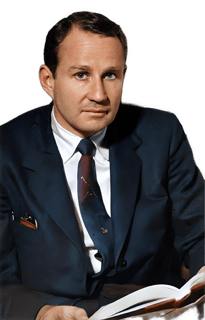 A reversed colorized enhanced photographic cutout of Wilfrid Sellars wearing a dark blue suit jacket over a white shirt and dark red and blue tie holding an open book in his lap used for visually identifying him.