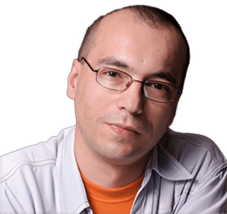 A reversed enhanced color photographic headshot cutout of Predrag Milidrag as a young man with glasses and his head tilted to his left shoulder wearing an orange undershirt under a light mauve collared shirt used to visually identify him.