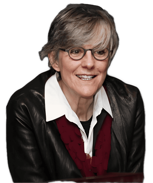 An enhanced reversed color photographic cutout of a glasses wearing Margaret D. Wilson from the waist up with a. lack leather jacket over a white large collared shirt and a red sweater used to visually identify her.