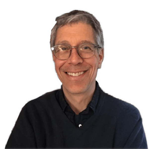 A reversed enhanced color photographic cutout of a smiling Steven Nadler wearing glasses and a black colored shirt with one white button showing under a black sweater used to visually identify him.