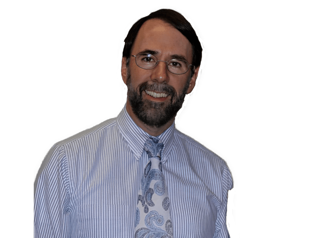 A reversed enhanced color photographic upper torso and headshot cutout of a glasses wearing Dennis L. Sepper with a. full beard and mustache and wearing a white collared shirt with thin gray vertical stripes and a light blue paisley tie used to visually identify him.