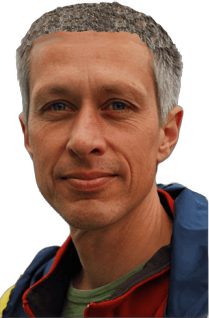 An enhanced color photographic headshot cutout of Matthew Stuart with cloned top of his head production and wearing a rounded neck green shirt under a dark blue outerwear jacket used to visually identify him.