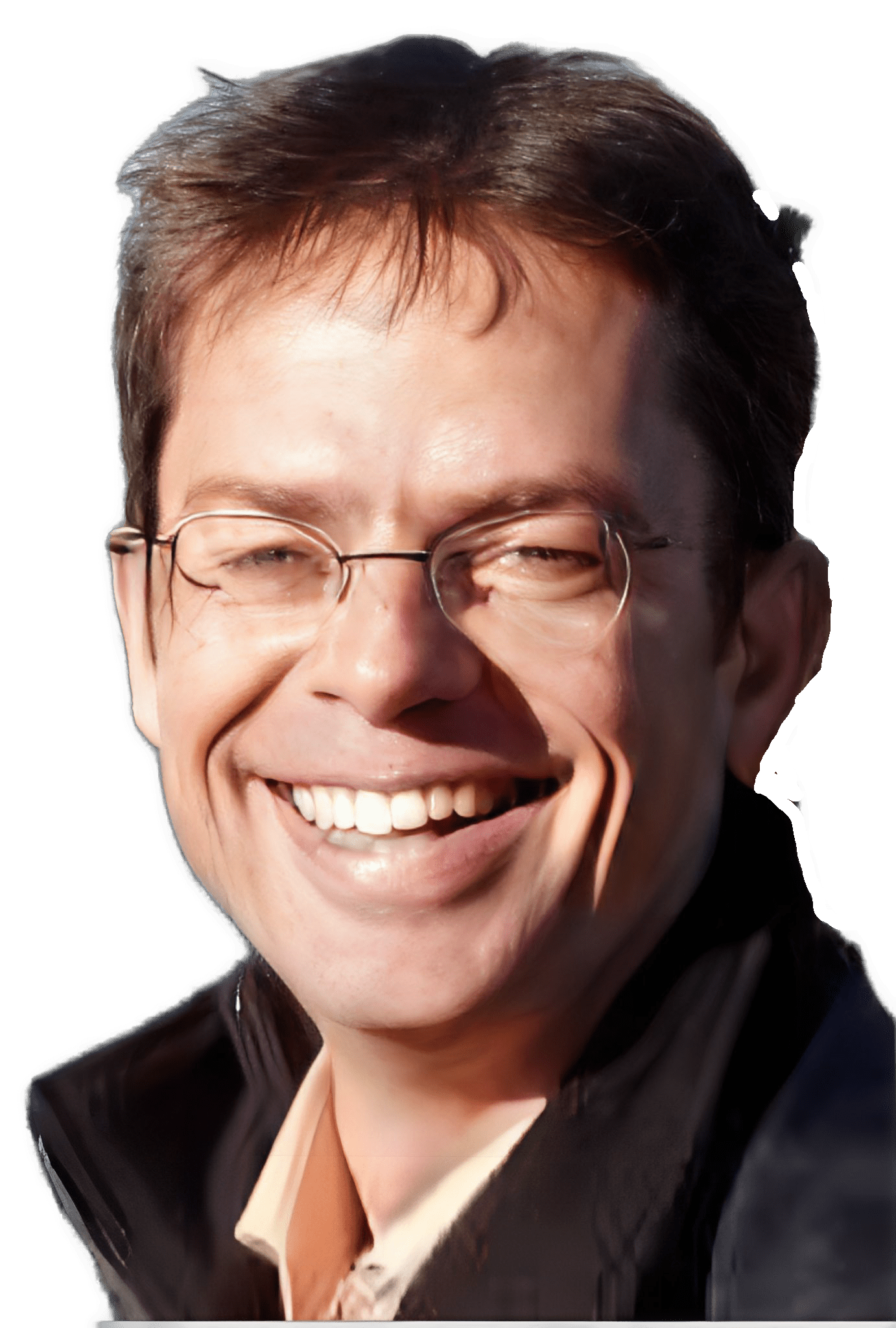 A reversed enhanced color photographic headshot cutout of a smiling Dominik Perlerr with rimless glasses and wearing a yellow polo shirt under a brown and dark gray outerwear jacket with an upturned right collar used to visually identify him.