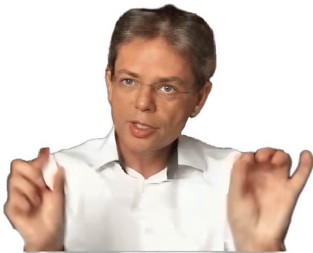 An enhanced color photographic upper torso to headshot cutout of an spesking Dominik Perler with rimless glasses and a white shirt with his hands up on either side making a point used to visually identify him.