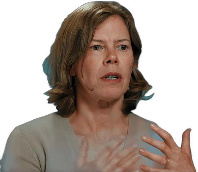 An enhanced colorized photographic headshot cutout of a lecturing Alison Simmons with an open mouth, wearing lipstick with both hands with open fingers gesturing towards each other at her throat level while wearing a v-necked tan shirt used for visual identification.