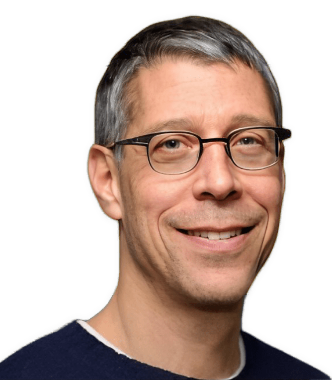 An enhanced color photographic cutout of a smiling Steven Nadler wearing glasses and a round neck white t-shirt under a round neck dark blue sweater was used for visual identification.