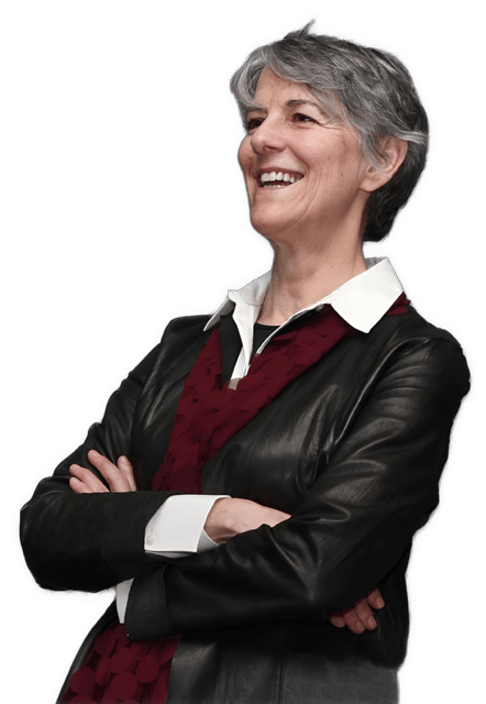 An enhanced photographic cutout of Margaret D. Wilson leaning back from the waist up with her arms folded, wearing glasses and an oversized collared white shirt with a deep red scarf and a black leather jacket is used for visual identification.