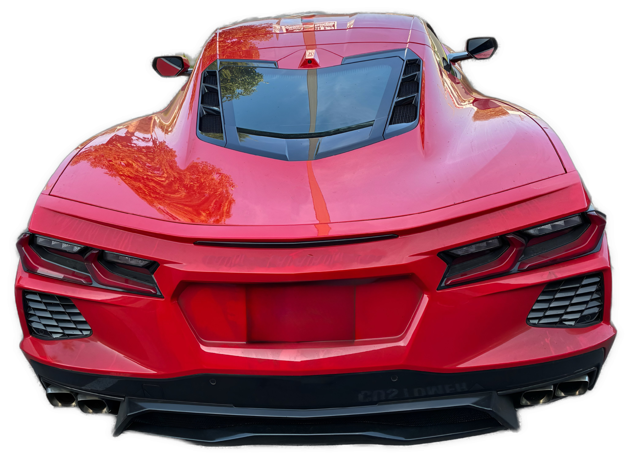 An enhanced photographic cutout of the rear end of a bright red modern Corvette Stingray is used as a bullet point.
