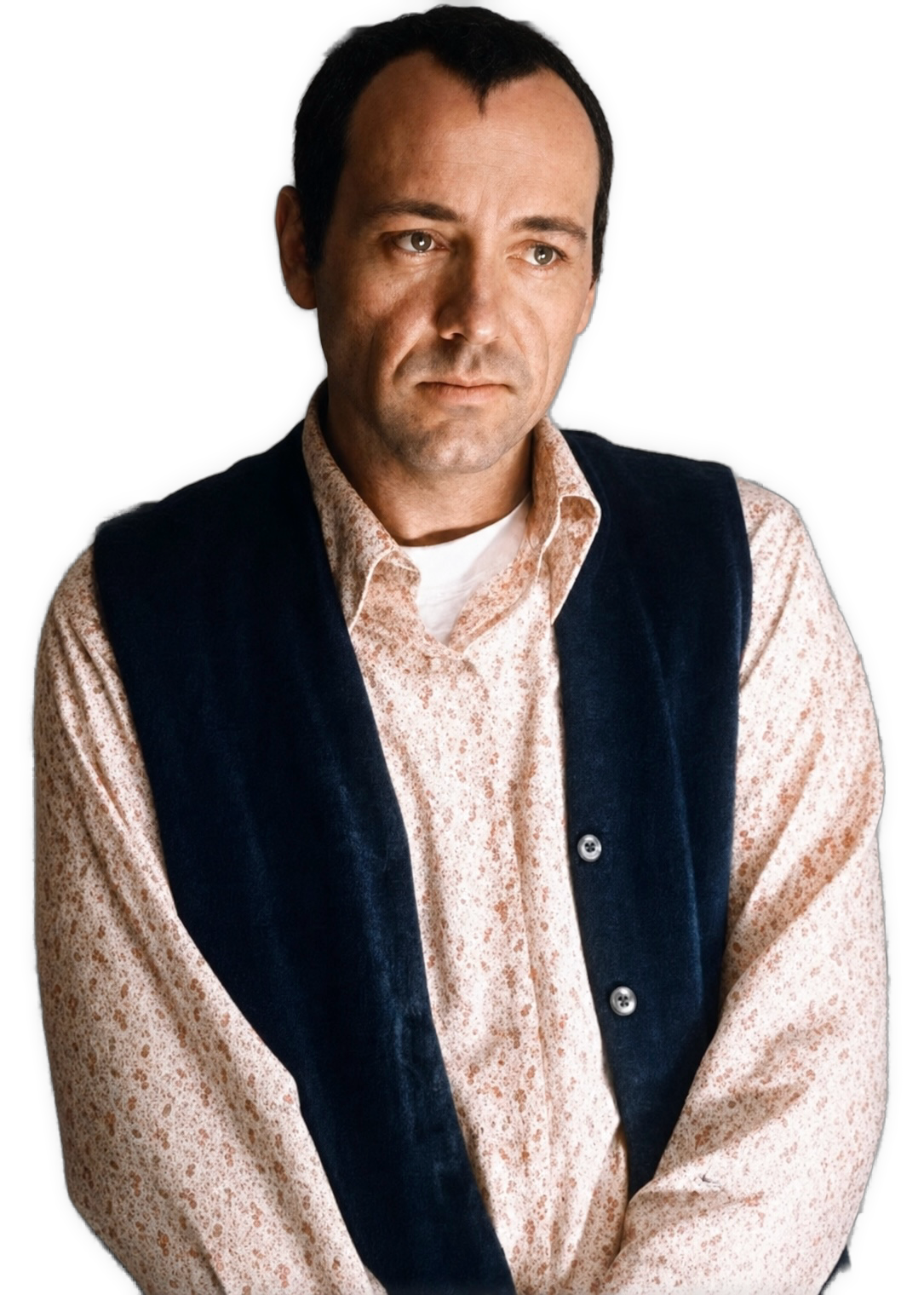 An enhanced,, colorized, and reversed iconic closing scene from “The Usual Suspects,” Kevin Spacey appears as Verbal Kint, a meek, limping small-time criminal who walks away from a police station with his posture gradually straightening and his limp disappearing, subtly transforming before the viewer’s eyes into the ruthless, mythical crime boss Keyser Söze whose face had only been glimpsed earlier in a crude composite sketch.